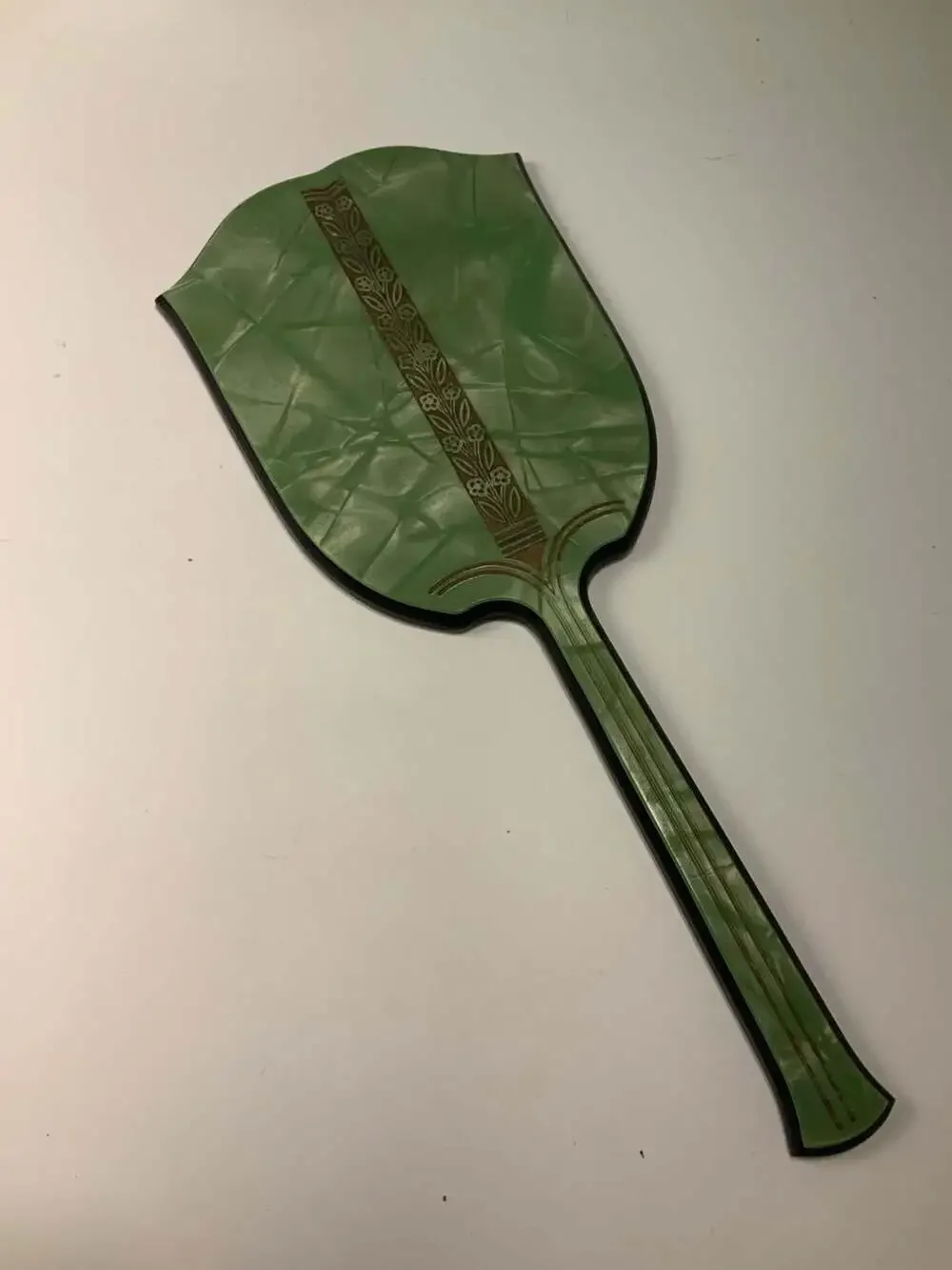 Vintage Art Deco Green Celluloid Hand Mirror With Floral Embossed Design